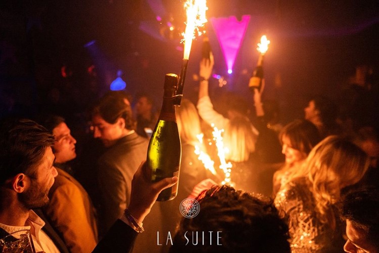 La Suite nightclub Marbella bottle champagne parade celebrate birthday hen bachelor parties