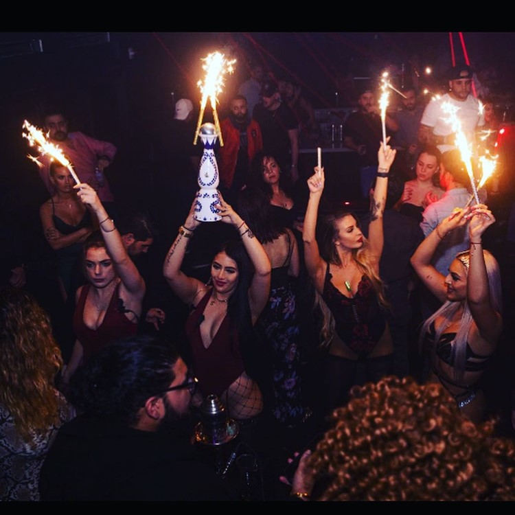 La V club in Miami nightclub vip bubbles parade waitresses bikinis