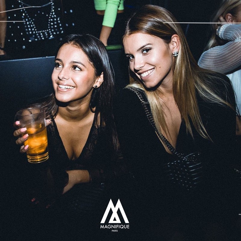 Le Magnifique Paris nightclub pretty girls having fun drinking dancing brunette girl 