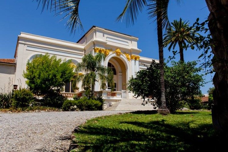 Le Palais de l’Olympe Cannes outside view castle palace old school design garden palm trees beautiful architecture 