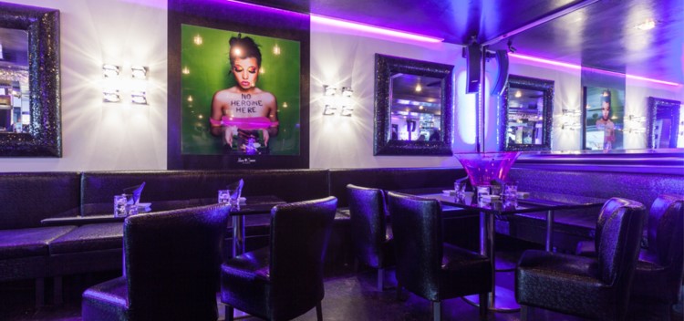 le quai nightclub st tropez view of the club at night with colored lights luxury interior design