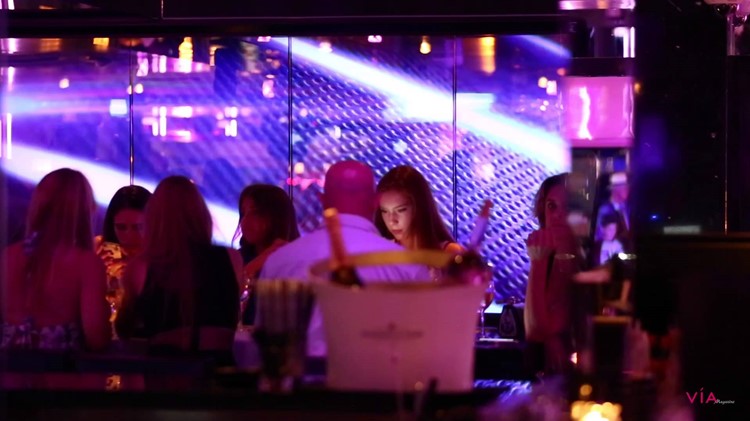 le quai nightclub st tropez beautiful girl socializing at a vip party nightlife club colored lights