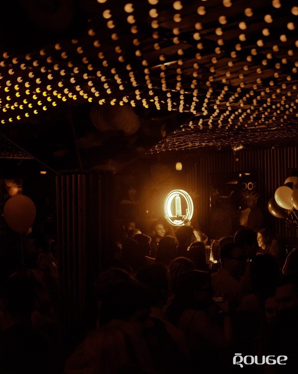 Le Rouge nightclub Montreal vodka bottle party alcohol menu book table 