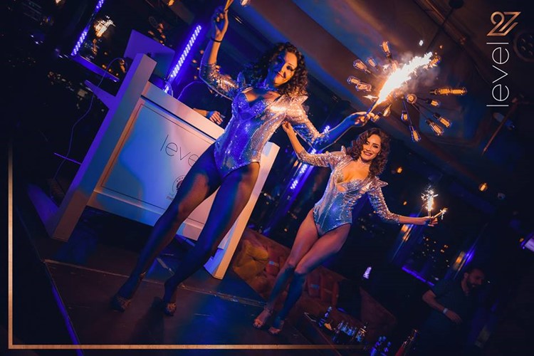 Level 27 Club nightclub Warsaw exotic dancer lights show in sexy costumes dance floor