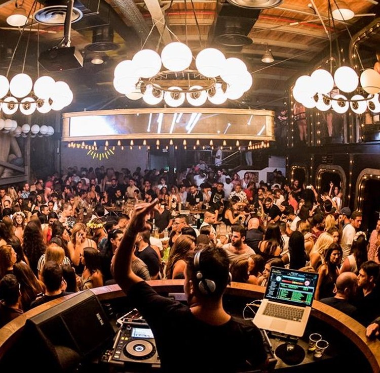 Lighthouse nightclub Tel Aviv dj mixing music crowd dancing