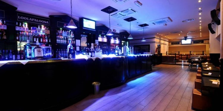 Loolapaloosa nightclub Milan party view of the bar drinks bottles alcohol