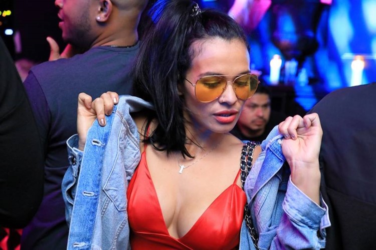 Love and Propaganda nightclub San Francisco sexy brunette girl in red leather bra dancing