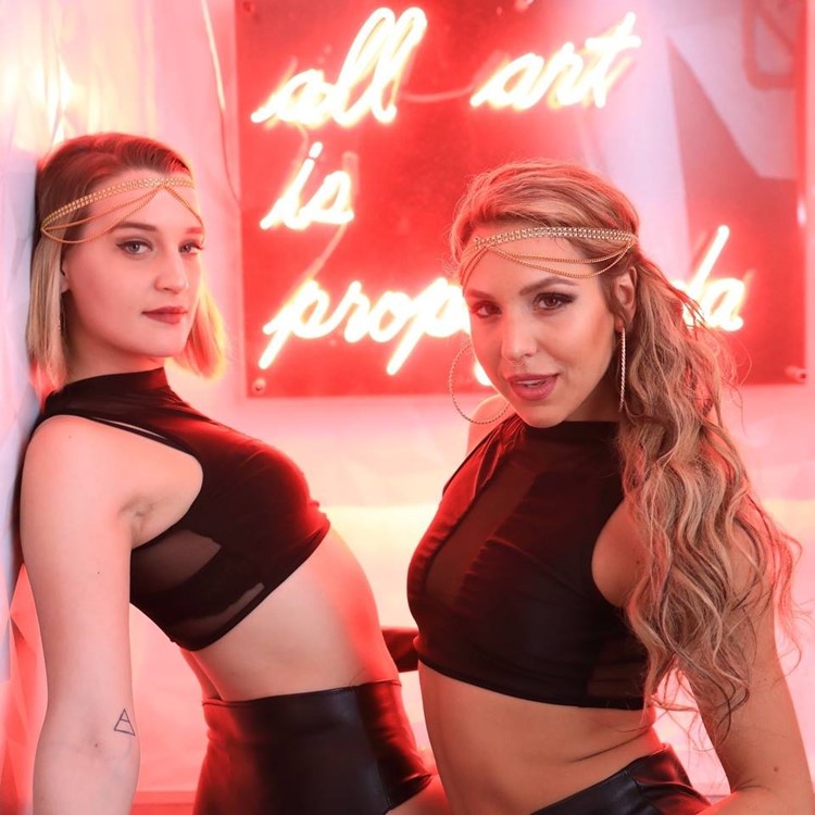 Love and Propaganda nightclub San Francisco two blonde dancers girls in black leather