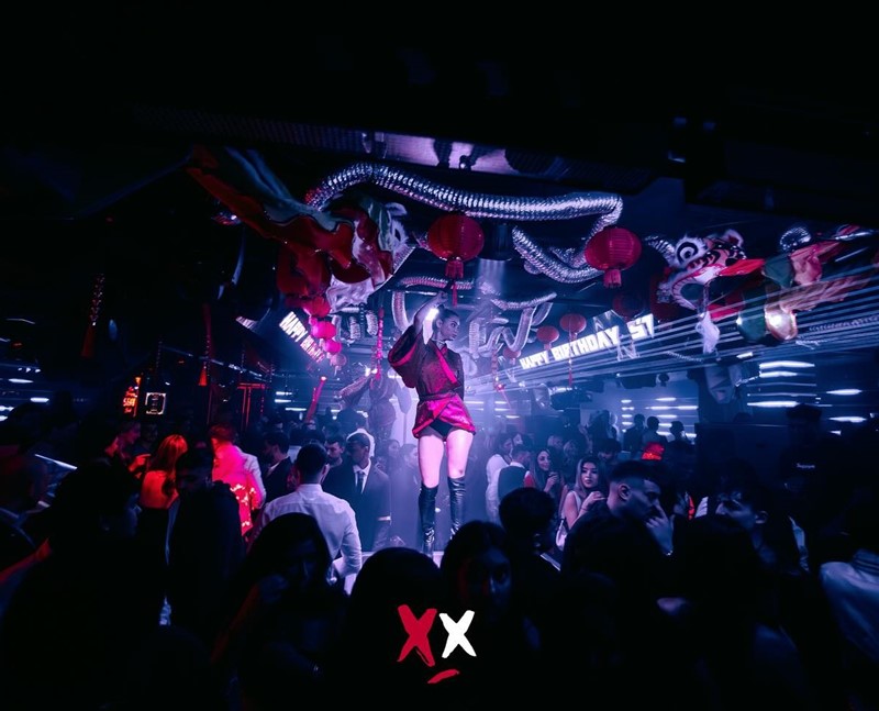 Luxx nightclub London dancer on stage blonde in sparkly lingerie suite costume