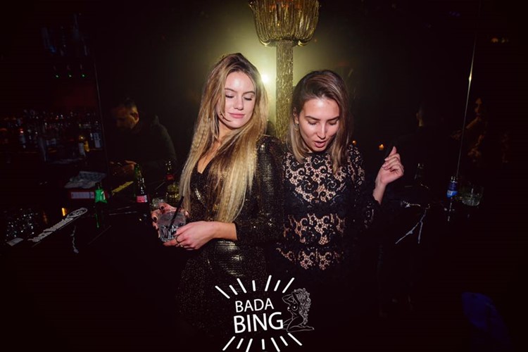 Maïa nightclub Amsterdam dress code blonde girls having fun drinking alcohol book your table