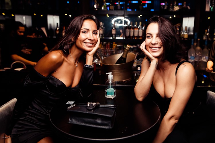 Mafia club Dubai pretty brunette girls having fun guest list mini black dress dresscode