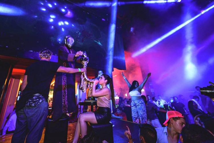 Mandala Club nightclub Cancun alcohol bottles vodka champagne fun party