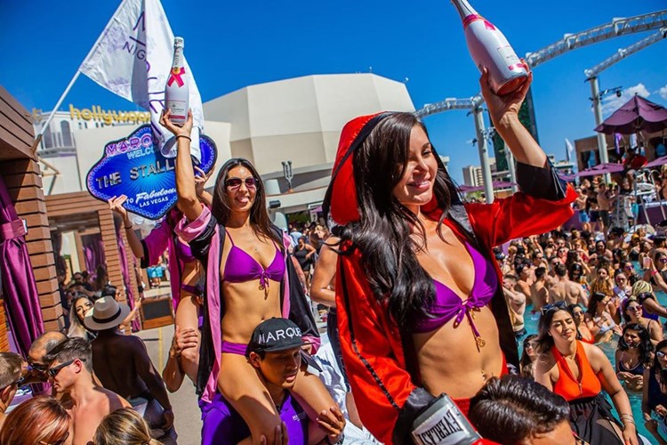 Marquee day club Las Vegas champagne parade bubbles girls waitresses celebrate birthday hen bachelor vip service