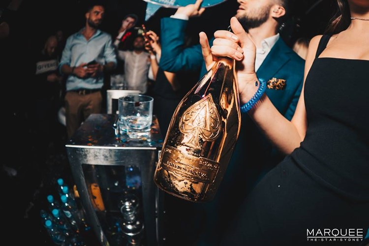 Marquee Club nightclub Sydney alcohol bottles champagne vodka table service