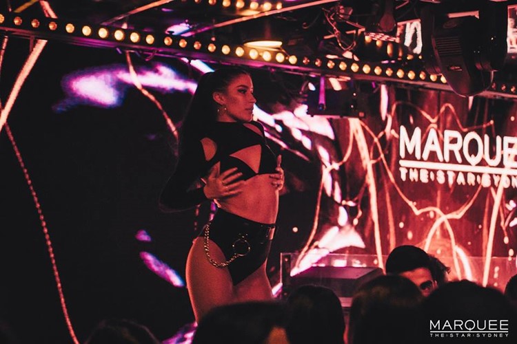 Marquee Club nightclub Sydney sexy exotic dancer in black leather lingerie dancing