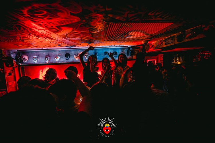 Medellin nightclub Paris crowd dancing having fun partying