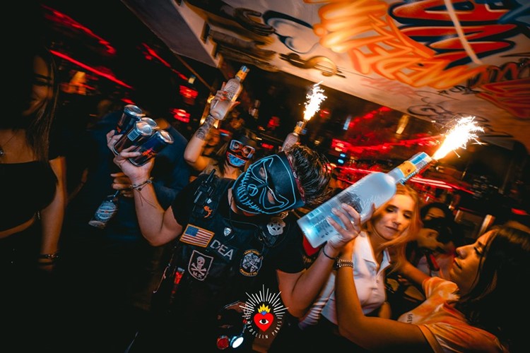 Medellin nightclub Paris celebrate champagne bottles book your own table now vip area reserve 