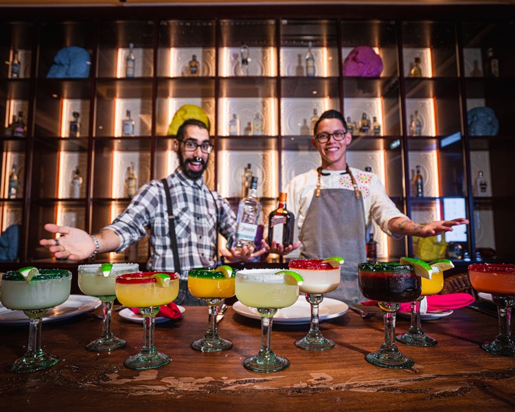 Meshico restaurant club Dubai bartenders cocktails mixers alcohol bottles book vip table