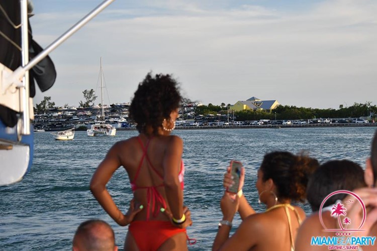 Miami Sea Party boat girls having fun red swiminsuit