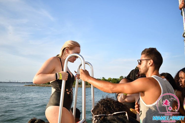 Miami Sea Party boat blonde sexy girl in black swimsuit wet