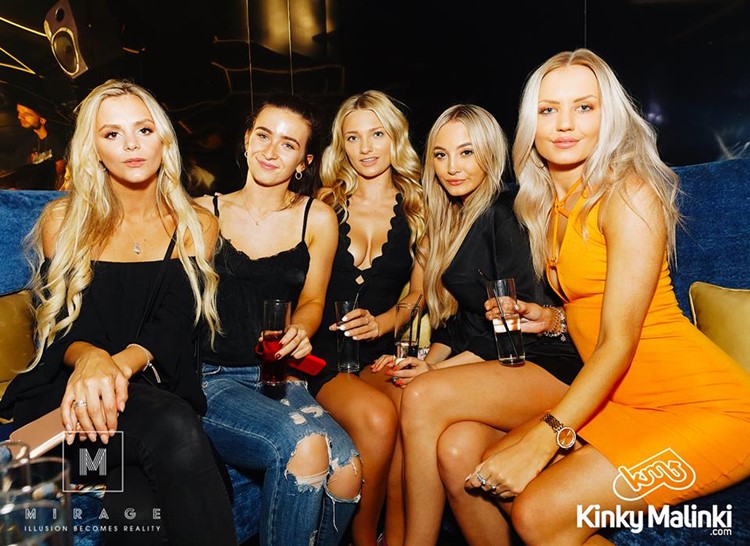 Mirage nightclub Marbella group of blonde girls dressed in sexy mini dresses having drinks