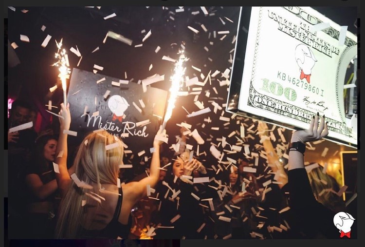 Mister Rich nightclub Dallas table reservation service alcohol bottles champagne vodka rum gin celebrate confetti sexy waitresses