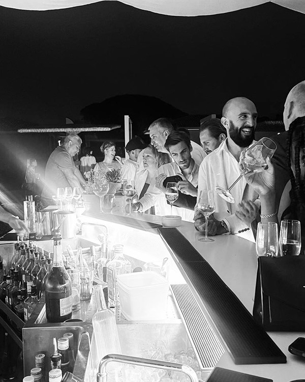 Moloko pool club St Tropez people partying drinking clubbing ordering drinks alcohol book vip table