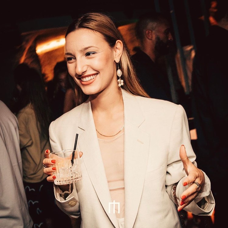 Moloko Pigalle nightclub Paris girl having fun drinking cocktails book your own vip table now reserve private area celebrate