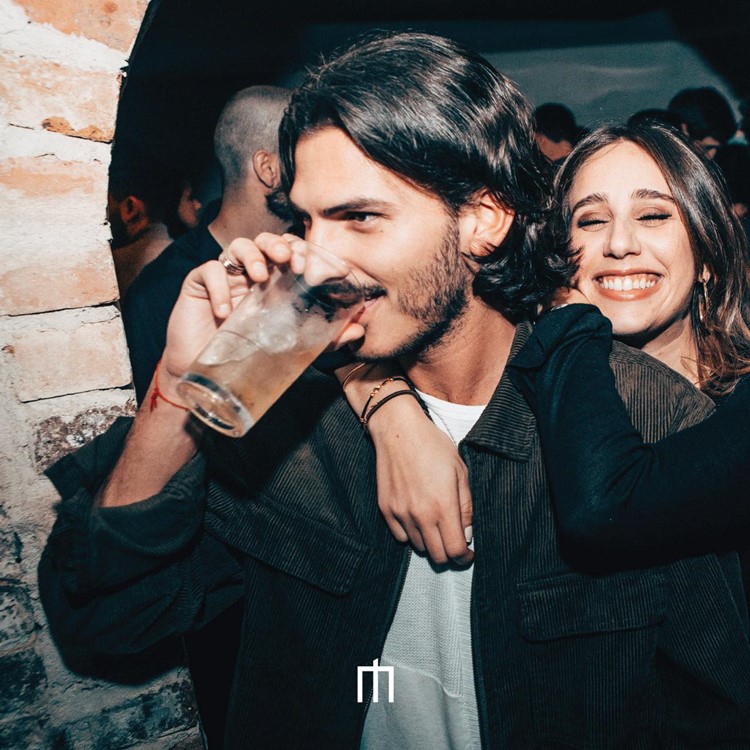 Moloko Pigalle nightclub in Paris club fun party music live dj guy girl hugging drinking 