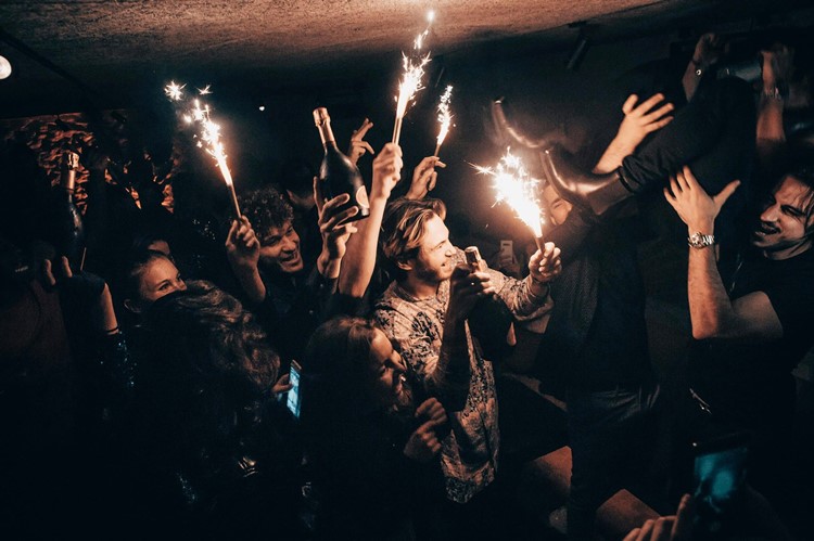 Moloko Pigalle nightclub in Paris bubbles champagne parade alcohol bottles celebrate birthday bachelor hen parties