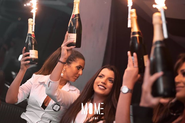 Mome nightclub Lisbon fun party girls big bottles of champagne vodka table service