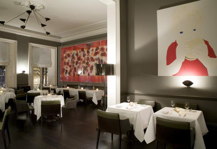 Morton's Members Club in London red artistic paintings on neutral interior design