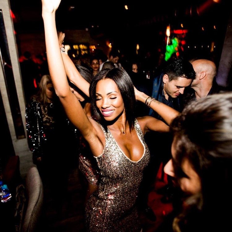 Mosh fun Kitchen club Marbella sexy brunette girl dancing having fun music mix dj crowd partying