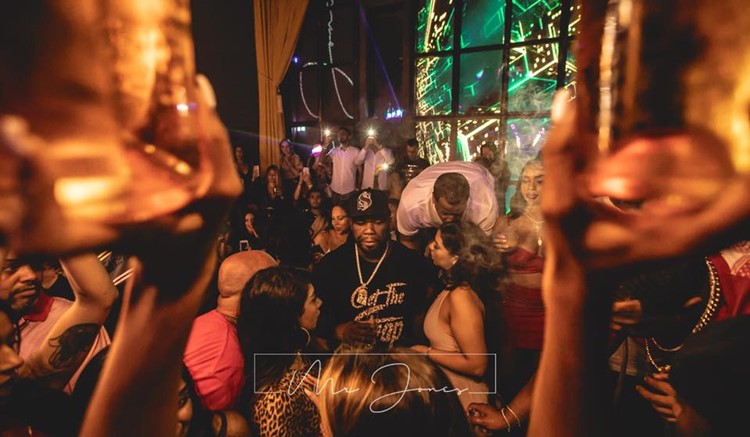 Mr Jones nightclub Miami 50 Cent celebrity show party singer drinking with girls