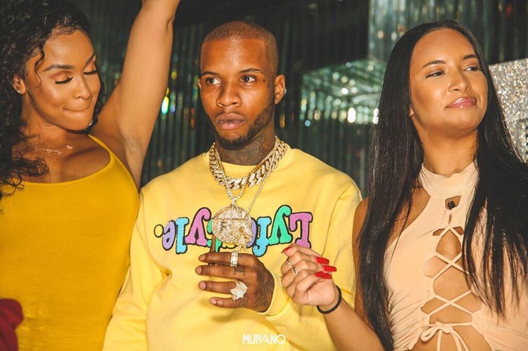 Murano nightclub Los Angeles famous artist rapper with two girls