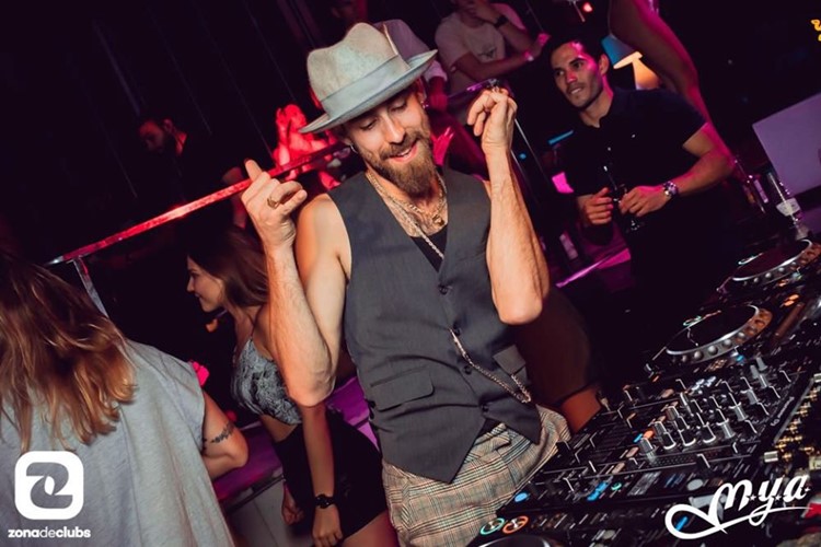 Mya nightclub Valencia dj mixing music fun party people dancing drinking partying all night long