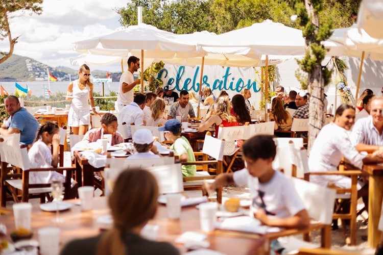 Nikki Beach beachclub Ibiza people having fun drinking all white dress code