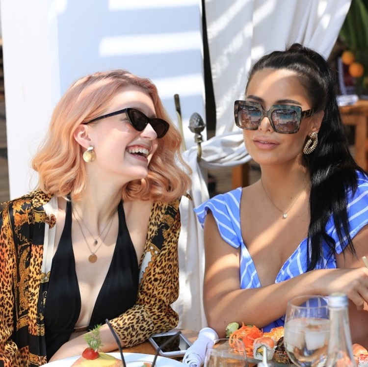 Nikki Beach club Marrakech fun ladies drinking eating summer hot sunglasses 