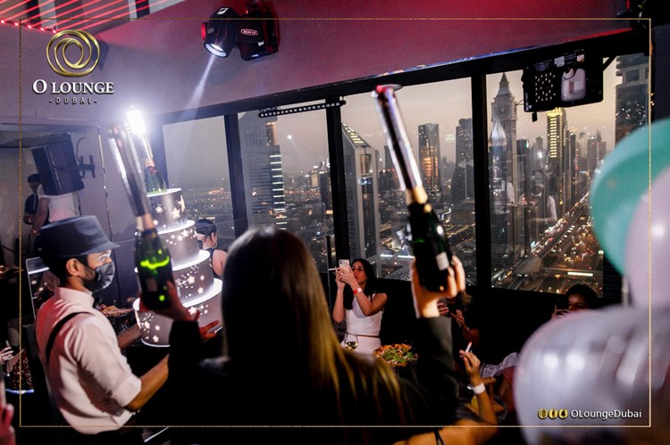 O Lounge club in Dubai celebrate champagne parade fun 