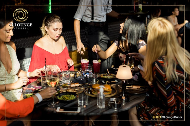 O Lounge club in Dubai girls having fun table reservation ladies night