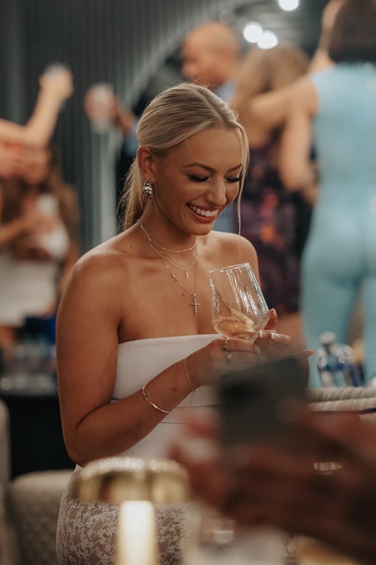 Occo club in Marbella pretty girl drinking cocktail mini black dress fun nightout