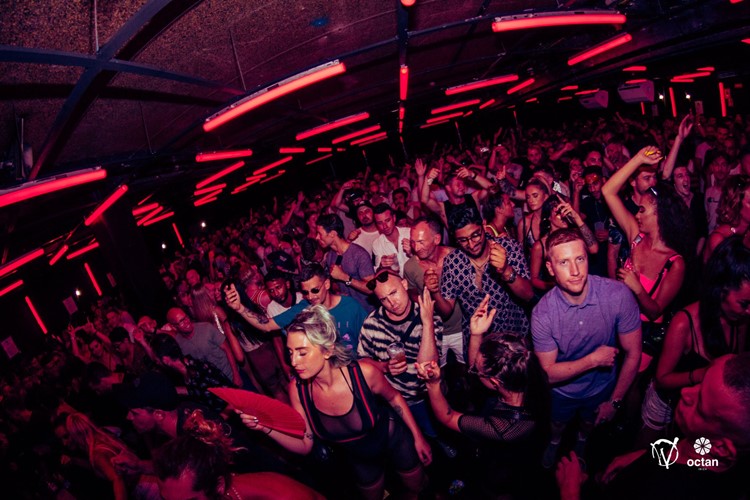 Octan nightclub Ibiza party all night rave techno dj mix lights show