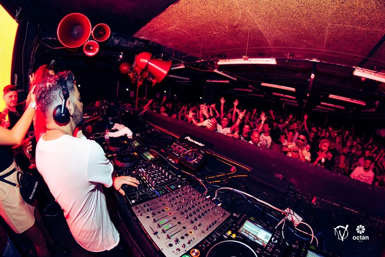 Octan nightclub Ibiza dj mixing music crowd partying dancing go out tonight club experience tickets