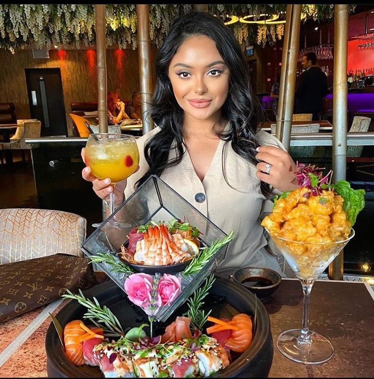 Oko restaurant club Birmingham pretty girl eating drinking fusion food alcohol drinks bottles dresscode mini dress vip entrance 