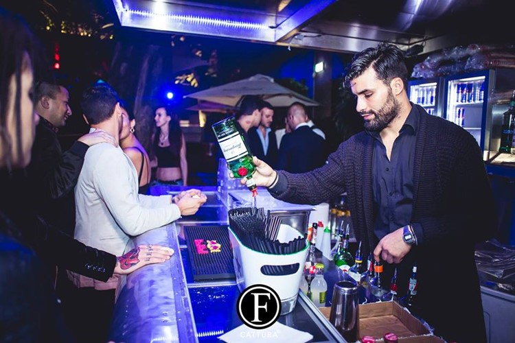 Old Fashion Club nightclub Milan party barman mixing drinks