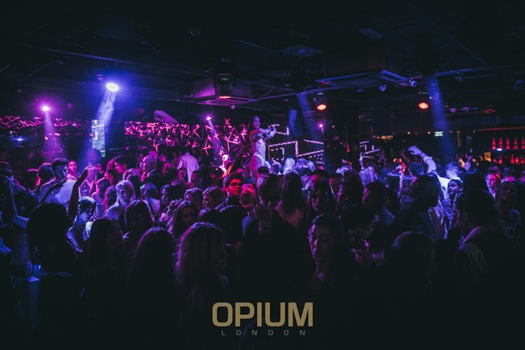 Opium nightclub London fun night exclusive crowd having fun partying dancing amazing club music lights atmosphere