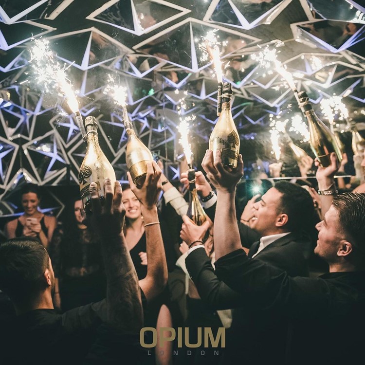 Opium nightclub London alcohol bottles table reservation service bring bottle to you celebrate