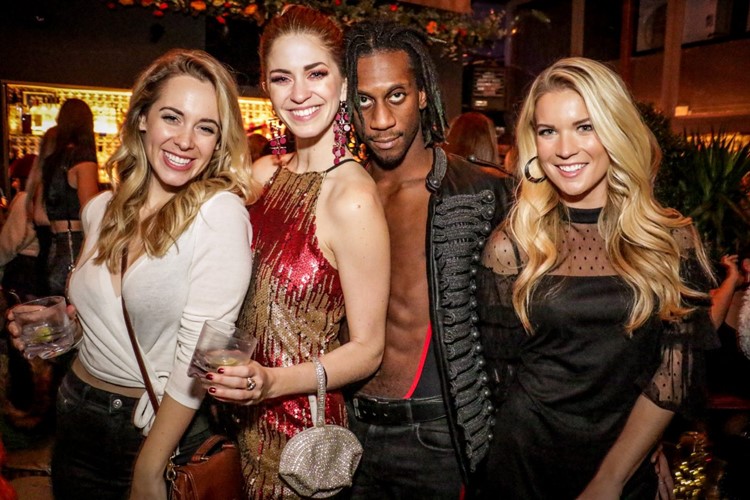 PHD Terrace club New York City sexy blonde girls having fun nightout dresscode minidresses high heels drinking dancing partying