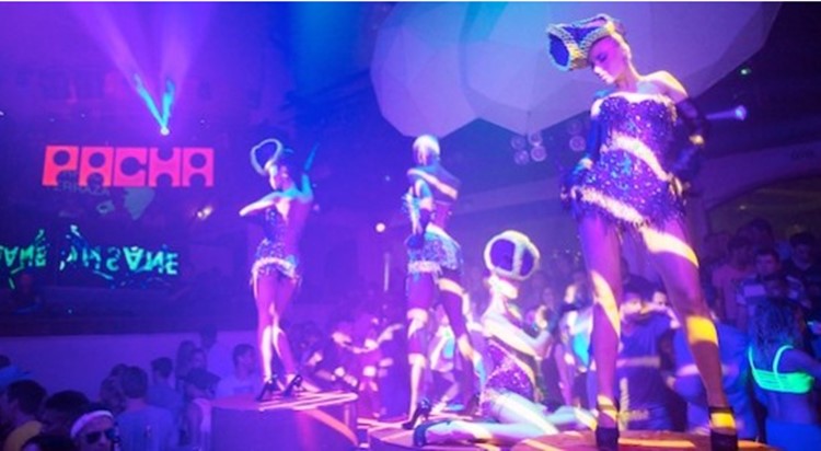 pacha nightclub ibiza exotic dancers dressed in mini skirts and underwear dancing on stages