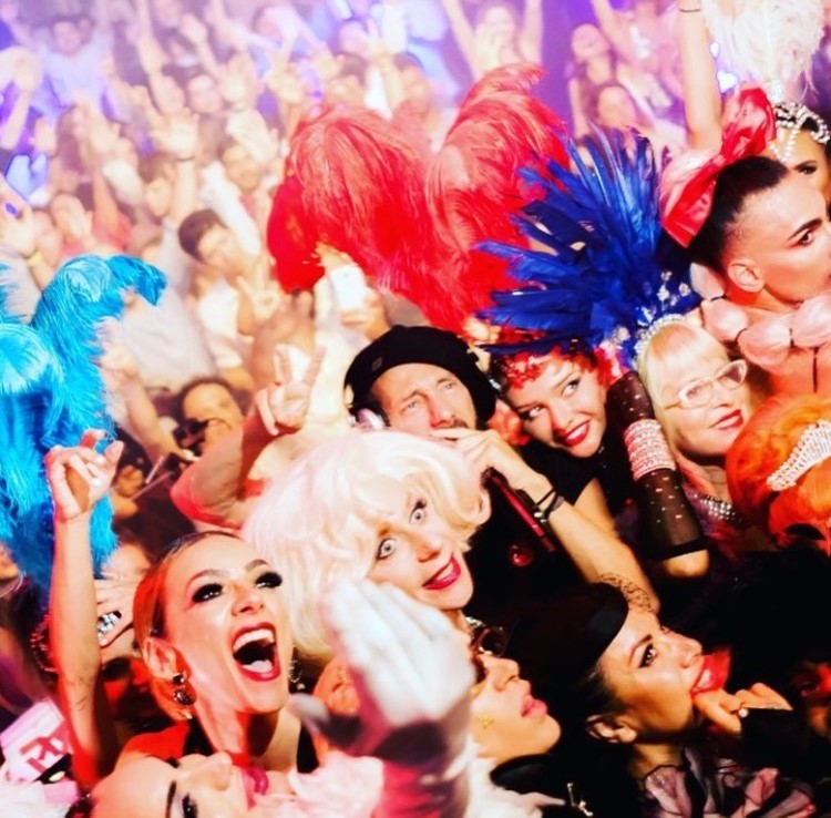 Pacha nightclub Ibiza group of exotic dancers girls wearing costumes